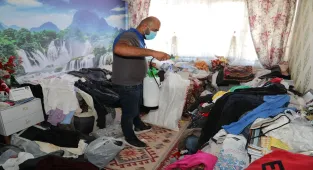 Eskişehir'de müstakil evden 1 ton çöp çıkarıldı